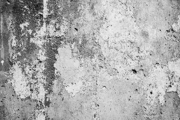 Obraz premium Weathered concrete wall texture with visible patterns and cracks