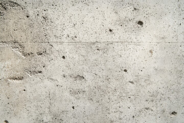 Obraz premium Textured concrete wall with patches and holes