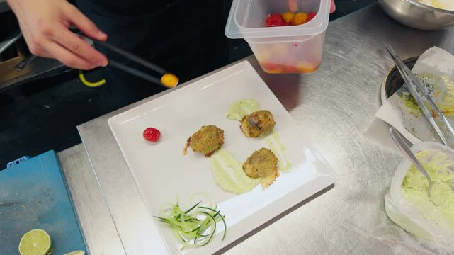 Plating Of A Raw And Cooked Fish Based Appetizer In A Luxury Italian Kitchen