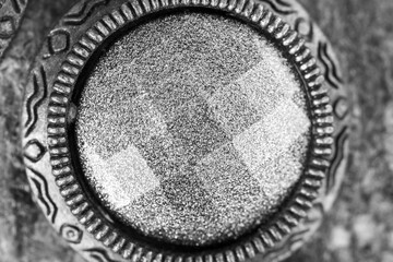 A circle in a shimmering natural stone, close -up jewelry