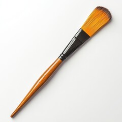 Fototapeta premium A classic paintbrush with a wooden handle and soft bristles on a white background