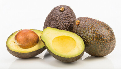 avocado, alligator pear or avocado pear - Persea americana - whole and half prized for its large and unusually oily fruit and known for a huge pit seed, isolated on white background