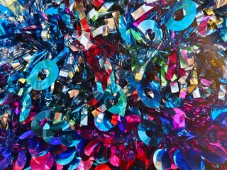 Obraz premium Happy new year background of shiny garlands of merry Christmas multicolored tinsel close-up