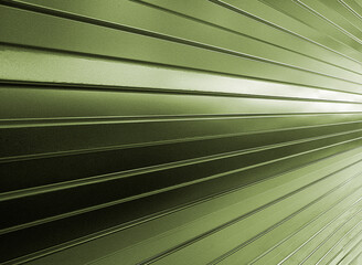 Olive green geometric abstract background. Metal shiny straight slats recede into the distance in perspective. Clean space for design.