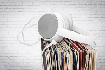 Old vinyl records background in a shelf.