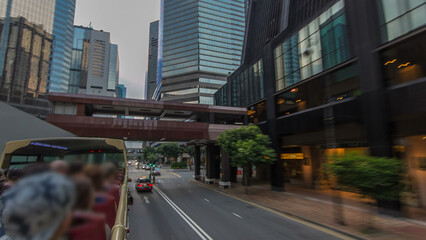 A Hong Kong streets view timelapse from open-top touristic bus during Hong Kong island's touring