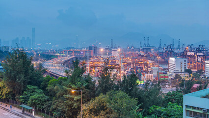 Fototapeta premium Hong Kong Skyline and Container Terminal day to night aerial timelapse