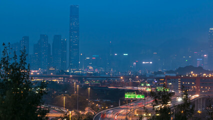 Fototapeta premium Hong Kong Skyline near Container Terminal day to night aerial timelapse