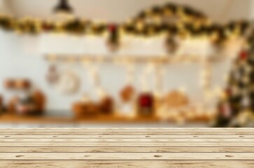 Wooden table top with blur Christmas tree background
