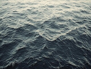 Fototapeta premium Dark Blue Ocean Waves, Ripples, and Surface Texture