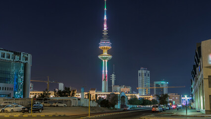 Naklejka premium The Liberation Tower timelapse hyperlapse in Kuwait City illuminated at night. Kuwait, Middle East