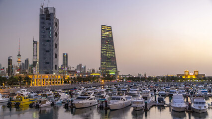 Obraz premium Yachts and boats at the Sharq Marina day to night timelapse in Kuwait. Kuwait City, Middle East