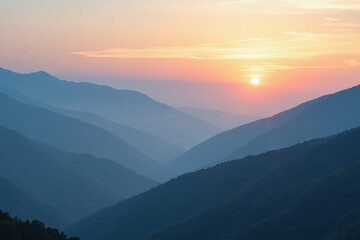 Fototapeta premium softly fading blue mountains meet misty morning skies creating serene peaceful natural scene