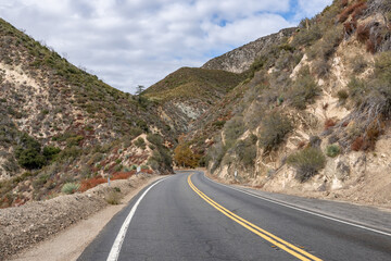 Fototapeta premium Metamorphic rocks / GNEISSIC ROCKS (gn) with dikes. Angeles Crest Scenic Byway, Los Angeles County, California. San Gabriel Mountains. angeles national forest, dike