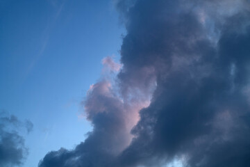 Cumulus clouds in a beautiful summer, evening sky.