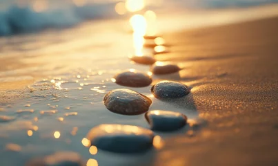 Selbstklebende Fototapeten A beach with a line of rocks on the sand © TheoTheWizard