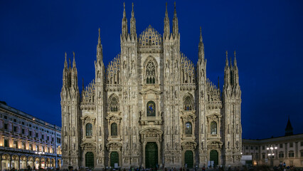 Fototapeta premium Milan Cathedral day to night timelapse Duomo di Milano is the gothic cathedral church of Milan, Italy.