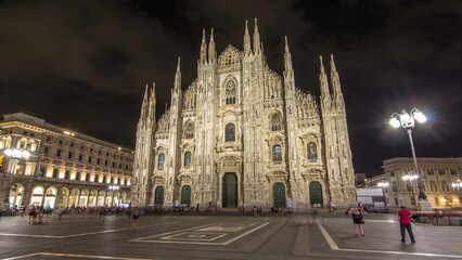 Obraz premium Milan Cathedral night timelapse hyperlapse Duomo di Milano is the gothic cathedral church of Milan, Italy.