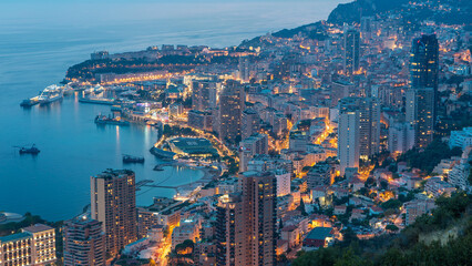 Obraz premium Aerial top view of Monaco from the grand corniche road day to night timelapse, Monaco France