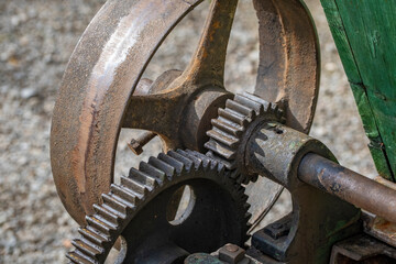 close shot of metal wheels in a farmers machine