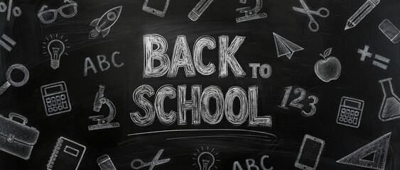 back to school frame with school drawings with white chalk texture on school blackboard