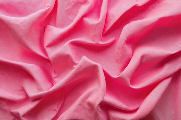 Obraz premium A close up shot of a pink fabric with folds