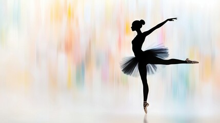   A ballerina in a black tutu against a colorful backdrop with a blurred background