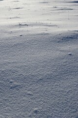 Fresh snow creating dimples and ripples on the surface