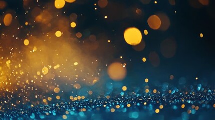 Obraz premium a blue and gold bokeh background with a black background