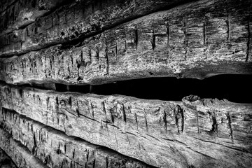 Old hand carved wooden wall of barn