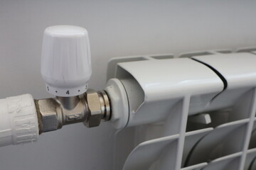 A view of a radiator valve and its connection to the heating system, highlighting its function