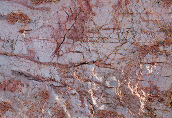 Background of natural rock that is pale pink and dark pink texture