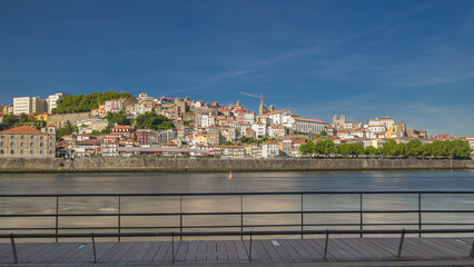 Obraz premium Douro River from waterfront timelapse hyperlapse in Porto, Portugal.