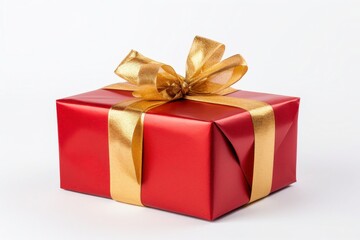 Obraz premium Bright Red Christmas Gift Box with Golden Ribbon on a Clean White Background Perfect for Celebrations, Birthdays, Holidays, and Special Occasions