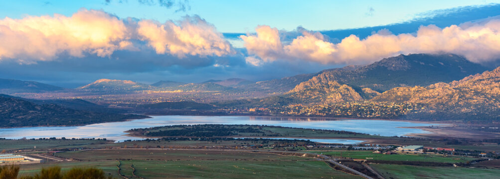 Great panoramic view of the Sierra de Guadarrama in Madrid with the lake of Santillana and the town of Manzanares el Real.