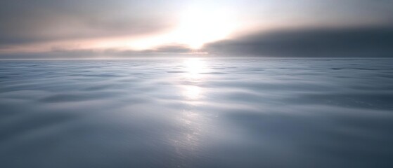 Obraz premium Landscape photograph of a vast expanse of water. the water is calm and still, reflecting the warm colors of the sky.