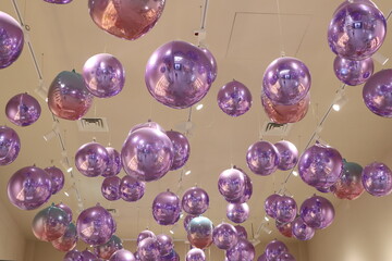 A Beautifully Colorful Display of Hanging Bubbles Creates an Artistic Atmosphere