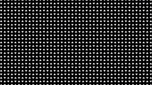 A pattern of white hearts is depicted on a transparent background, which rotate around their axis, increase and decrease, falling down. Animated background for Valentine's Day.