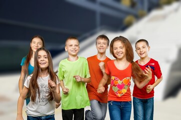 Smiling teenagers school students friends outside