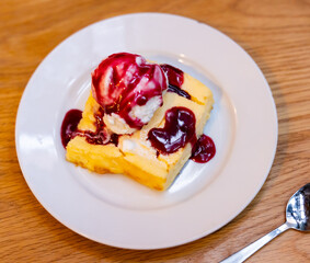 Slice of easy and tasty berry cheesecake.