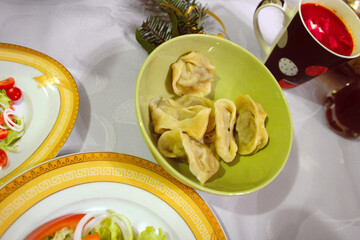 Traditional small Polish pierogi “uszka”, an accompaniment to red borscht in Poland on Christmas Day, polish food
