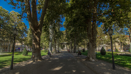 People around pavillion in Zrinjevac park timelapse hyperlapse in Zagreb, Croatia.