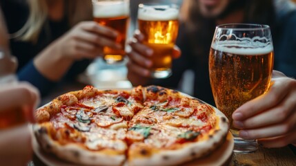 leisure, food and drinks, people and holidays concept - close up of friends eating pizza and drinking beer at restaurant or pub