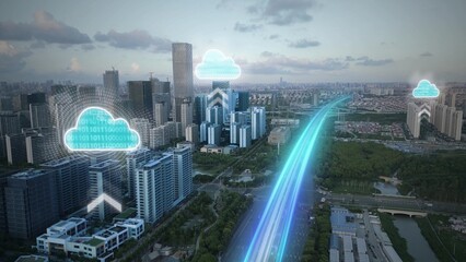 Aerial of smart city with digital graphic of business infrastructure. Computer cloud animations over the skyscrapers symbolizing cloud computing and connectivity