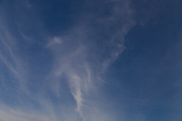 Texture of thin clouds in a blue sky.