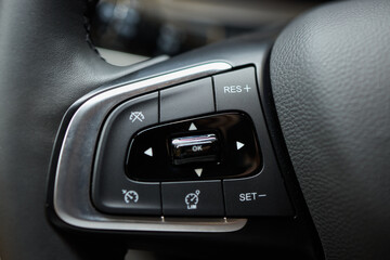 The modern cars steering wheel control panel boosts convenience and performance