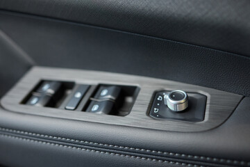 Obraz premium Modern Car Door Control Panel with Window Switches for convenience and functionality