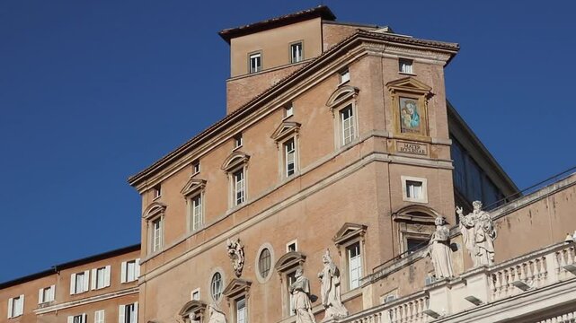 Vatican city saint peter square, majestic apostolic palace and dome panning in slow motion