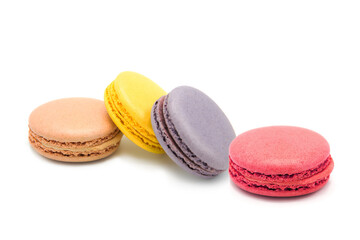 Sweet colorful varied assortment macarons cookies with filling isolated on a white background. Handmade traditional sweets. Clipping Path.	