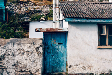 Wooden Door Gate in Country Small House, Cottage in Village Landscape
